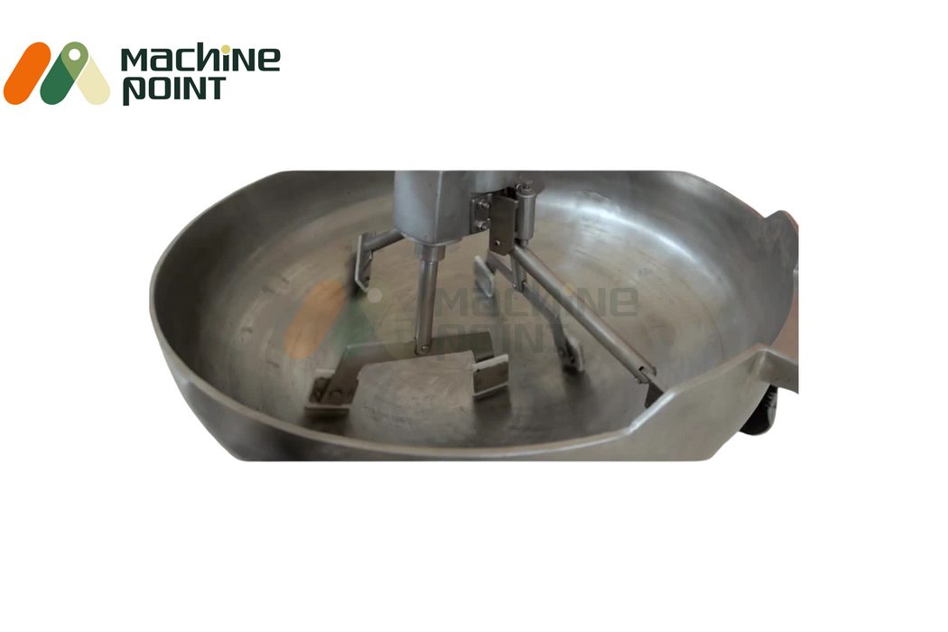 Empty stainless steel cooking vessel of 4-feet halwa machine with automated rotating paddles for industrial use.