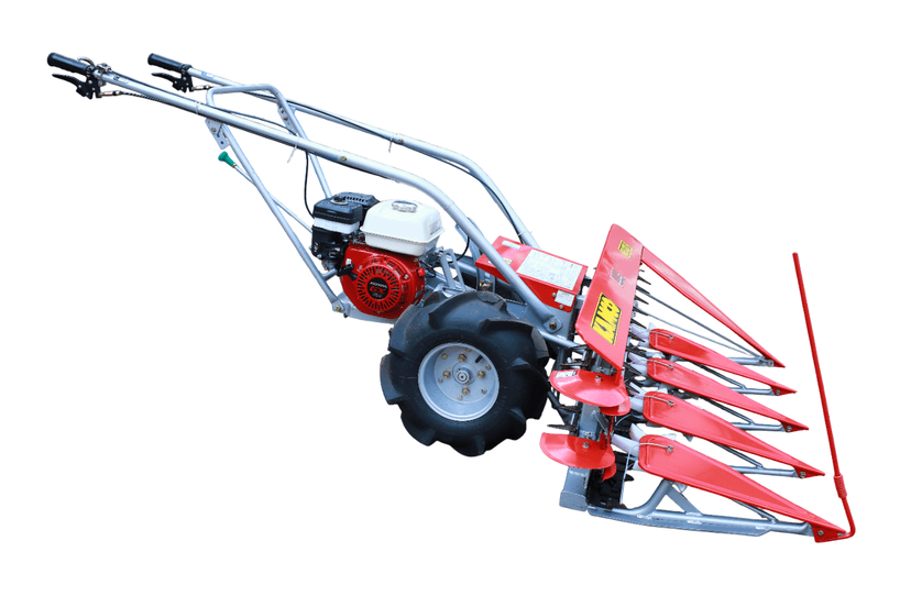 Detailed view of the reciprocating knife bar and chain conveyor system on Kamco KR120H crop reaper for clean cutting