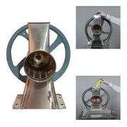 Kadukas Bhuka Machine in use – manual demonstration of vegetable feeding into grating chamber.