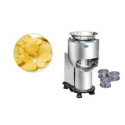 Compact Potato Wafer Machine with circular slicing disc set and sample wafer output, used for high-speed slicing in food processing.