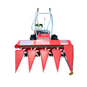 Petrol operated power reaper for wheat and grain crops