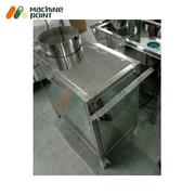 Diagonal view of the SS masala grinder with robust stainless steel construction, hopper opening, and sturdy support frame for durable grinding operations.