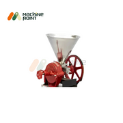 Front view of Wet Dal Machine showing dal being processed and collected in a bowl, highlighting grinding output performance.
