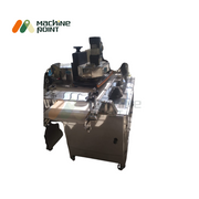 Front view of Jamun Ball Making Machine showing belt-driven processing unit and stainless steel conveyor for continuous operation.