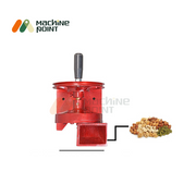 Top view of Hand Dry Fruits Machine Big showing output chute and handle, with dry fruits illustrated as input material.