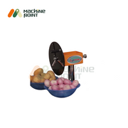 Compact potato and onion slicer machine with fresh potatoes and onions ready for slicing.