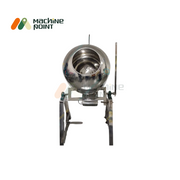 Front-facing flavouring pan machine with tiltable drum and ergonomic handle for manual operation.