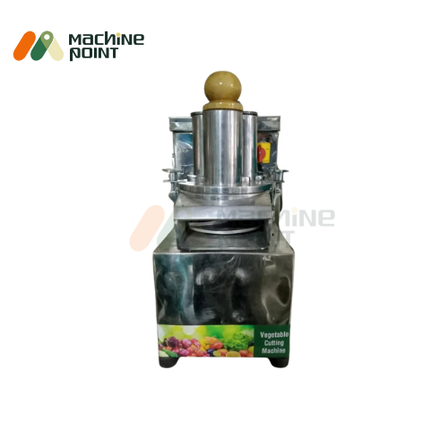 Front view of Vegetable Cutting Machine Regular featuring compact design, round pusher, and colorful label showcasing vegetable cutting capabilities.