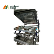 Tray Sealer Machine – Stainless steel commercial-grade machine with open sealing lid, designed for multi-compartment food tray sealing.
