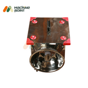 Top-down view of the Coconut Scrapper featuring a stainless steel body with red rubber pads and a visible scrapping blade inside.