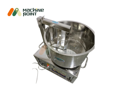 Top view of 40 kg shrikhand mixing machine with stainless steel bowl and vertical mixing blades.