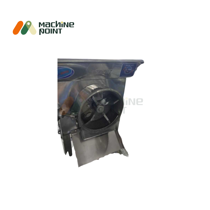 Close-up of Gravy Machine 1 HP grinding blade and outlet tray, suitable for making pastes and gravies.