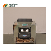 Close-up of Dough Sheeter flattening atta – reliable and durable kitchen equipment.