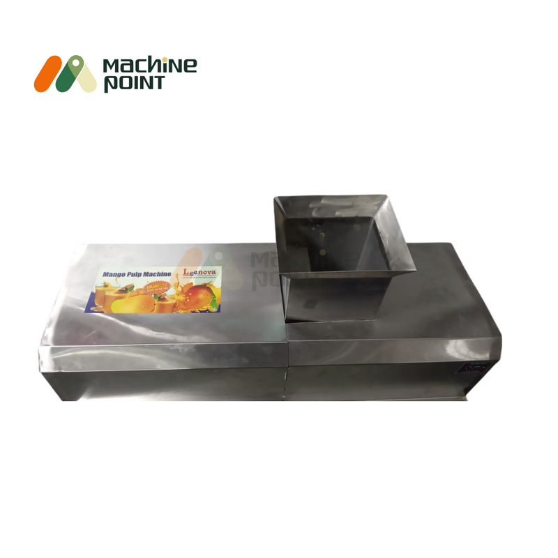 Mango pulp extraction process using medium-sized machine for food processing units.