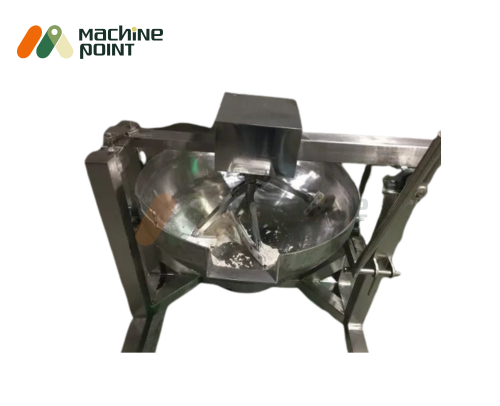Top view of 2-feet halwa machine in operation, showing mixture being stirred by mechanized paddles.
