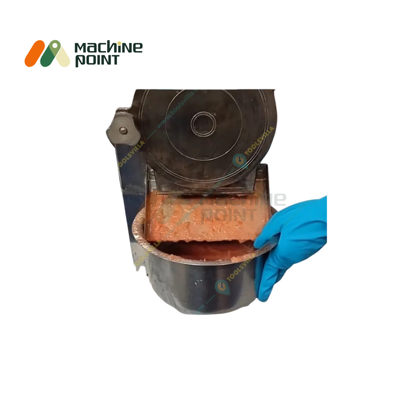 Processed Tomato Gravy Dispensed from 7 HP Machine
Close-up of tomato gravy being collected from machine outlet into stainless container, suitable for mass food prep.
