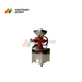 Side profile of Wet Dal Machine showing red cast iron grinding body with stainless steel stand and funnel-shaped hopper.
