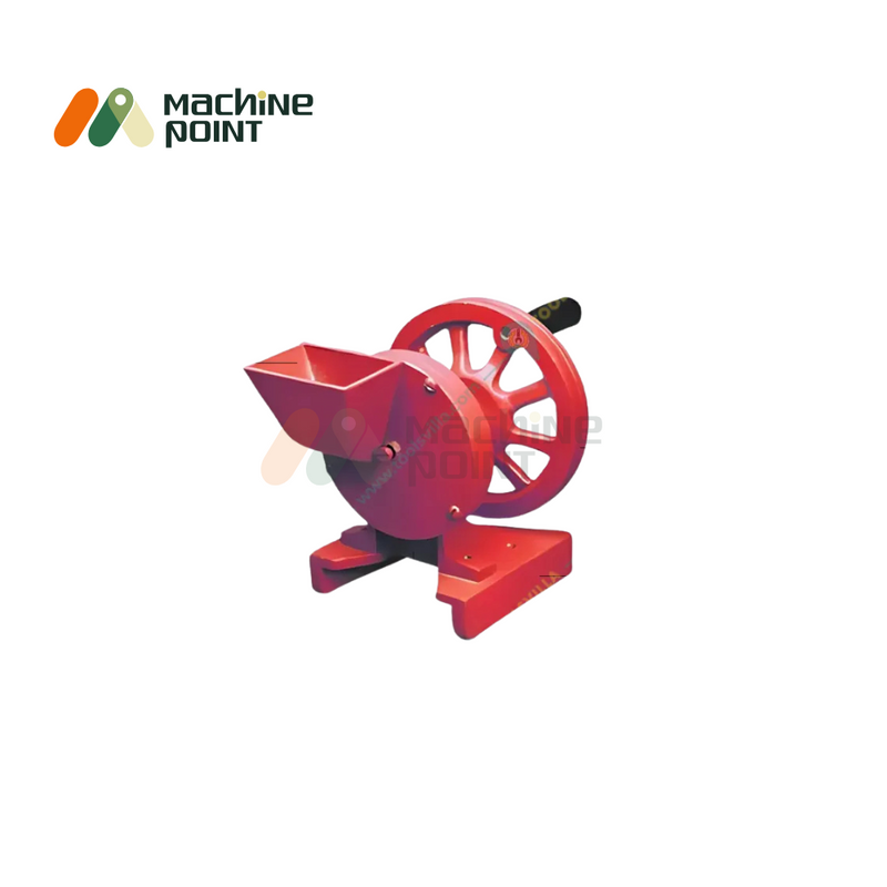 Clean angled view of Hand Dry Fruits Machine Big with red flywheel and cast body, designed for commercial or home use.