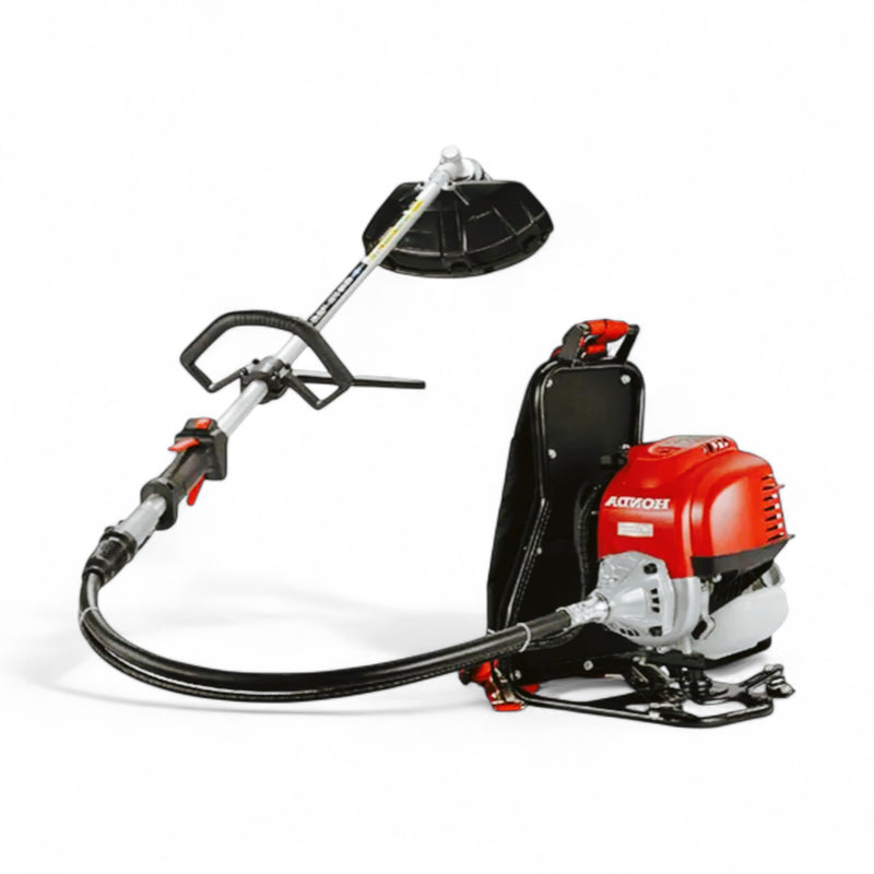 Honda GX-35 Brush Cutter Showing Blade, Tube, and Harness

