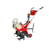 Compact petrol-powered mini tiller with ergonomic handle and durable rotary blades – ideal for home gardening, inter-row cultivation, and small farm soil preparation