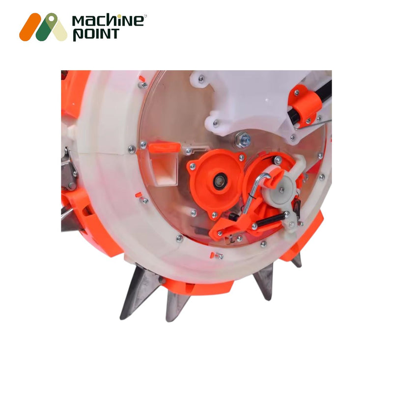 Adjustable manual seed and fertilizer drill machine with rotating drum and ergonomic handle
